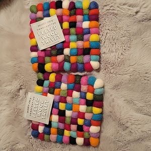 Pair of Trader Joe's handcrafted fileted wool trivets 6" by 6" NWT rainbow